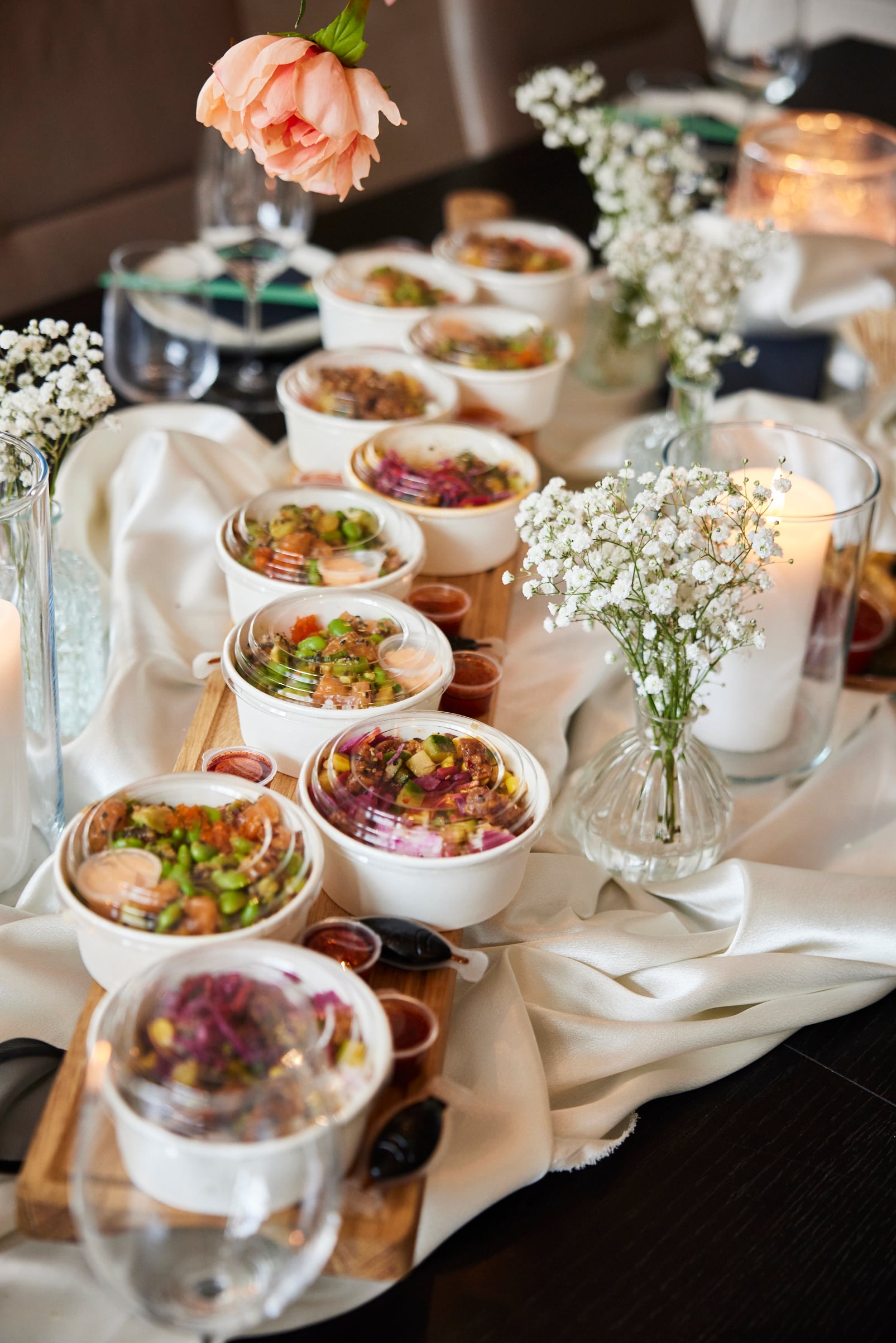 Poké Perfect dinner catering - evening table setting with poké bowls