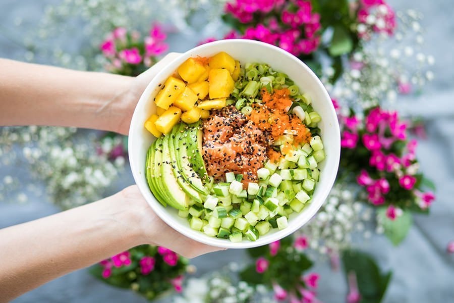 Een kleurrijke poké bowl van Poké Perfect, symbolisch voor onze toewijding aan verse, gezonde ingrediënten en de liefde voor authentieke smaken.